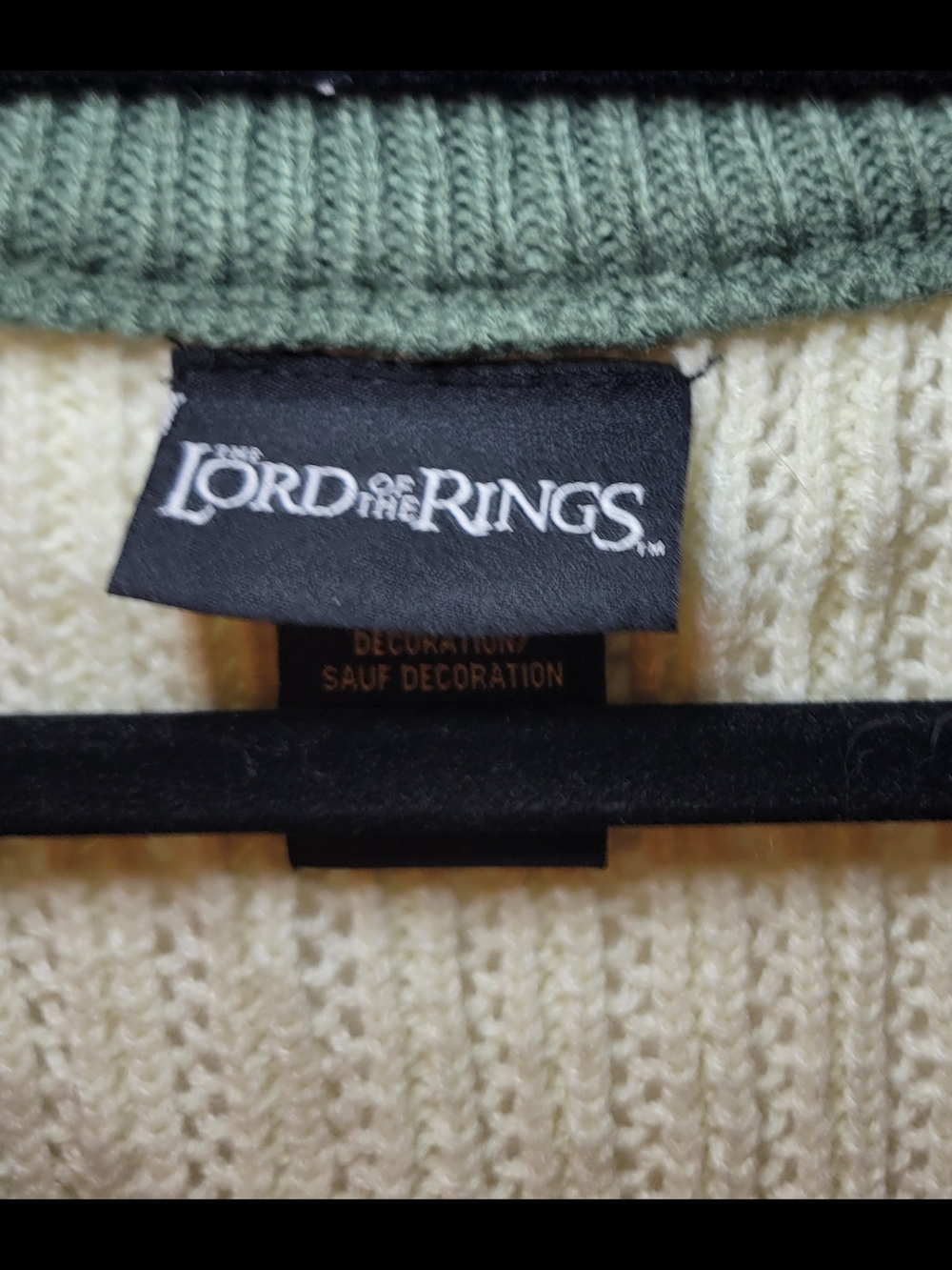 Sleeveless Knit Vest in Ivory with Green Trim and Embroidered Motifs - Picture 3 of 4